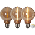 Trzy dekoracyjne żarówki LED E27 z bursztynowym szkłem i pionowym filamentem LED pokazujące trzy poziomy jasności światła z funkcją 3-Step Dimming.