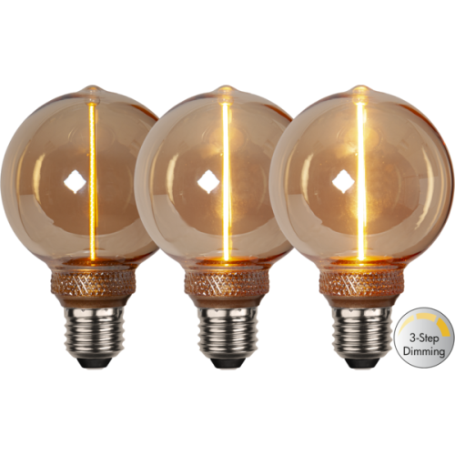Trzy dekoracyjne żarówki LED E27 z bursztynowym szkłem i pionowym filamentem LED pokazujące trzy poziomy jasności światła z funkcją 3-Step Dimming.