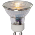 Żarówka LED GU10 emitująca delikatne ciepłe światło, szklany klosz reflektorowy.