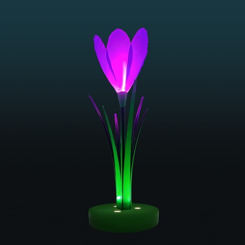 Dekoracja świetlna LED w kształcie krokusa na ciemnym tle, nowoczesny fotopunkt z podświetlanymi płatkami i zielonymi liśćmi, przeznaczony do przestrzeni miejskich, eventów i instalacji plenerowych.