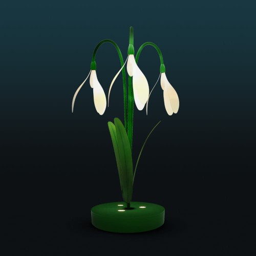 Dekoracja świetlna LED w kształcie przebiśniegów na ciemnym tle, nowoczesny fotopunkt z delikatnie podświetlanymi płatkami i zielonymi łodygami, przeznaczony do przestrzeni miejskich, parków i instalacji plenerowych.