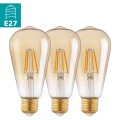 Trzy dekoracyjne żarówki LED ST64 4W z gwintem E27, o bursztynowym szkle i widocznych filamentach. Klasyczny kształt retro przeznaczony do girland ogrodowych i oświetlenia dekoracyjnego.