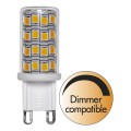 Żarówka LED G9 z diodami SMD w przezroczystej obudowie oraz oznaczeniem dimmer compatible, trzonek pętlowy.
