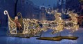 Iluminacja świąteczna Złote Sanie 3D LED z reniferami – dekoracja miejska w stylu premium, z efektem NEON LED i świetlnymi splotami, tworząca fotogeniczną zimową scenę w centrum miasta.