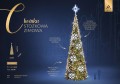 Stożkowa choinka LED o wysokości 11,2 metra z motywem dużych śnieżynek i jasną gwiazdą na szczycie, ozdobiona migoczącym światłem.