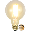 Żarówka LED E27 G95 filament 2700K z mosiężnym gwintem, ciepłe białe światło, dimmer compatible, kulista przezroczysta bańka.