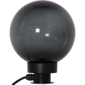 Lampa stojąca ORBY z dużą szklaną kulą w przydymionym kolorze i widocznym źródłem światła E27.