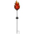Dekoracyjna lampa solarna LED w formie płomienia na szpikulcu. Metalowa konstrukcja z ozdobnym kloszem i bursztynowym światłem stanowi elegancki akcent do ogrodu, na rabaty lub wzdłuż ścieżek.