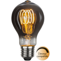 Żarówka LED filament E27 z przydymionym kloszem i spiralnym filamentem emitująca ciepłe białe światło, dimmer compatible, dekoracyjne źródło światła do nowoczesnych lamp.