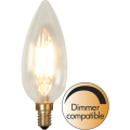 Żarówka LED E14 świecowa C35 z przezroczystym szkłem i dekoracyjnym filamentem, ciepła barwa światła, złoty gwint, oznaczenie dimmer compatible, ujęcie produktowe.