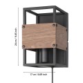 Kinkiet EVESHAM o otwartej geometrycznej konstrukcji z czarnego metalu, ozdobiony szeroką brązową deską na przedniej części.