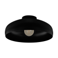 Lampa sufitowa MOGANO z czarnego metalu, z szerokim okrągłym kloszem o łagodnie wyprofilowanych krawędziach i otwartym spodzie.