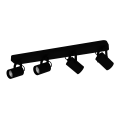 Reflektor sufitowy LED SOREGO z czarną metalową belką i czterema niewielkimi reflektorami rozmieszczonymi w jednej linii.