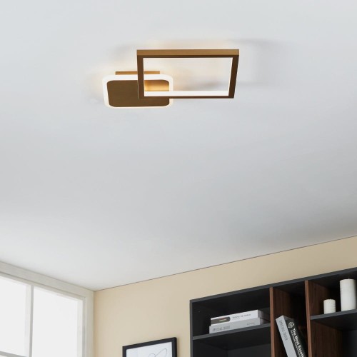 Lampa sufitowa LED GAFARES 15W o geometrycznej formie dwóch połączonych kwadratów, zamontowana na suficie i emitująca białe światło.