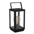 Metalowa lampa stołowa BRADFORD 1 w czarnym kolorze, z prostokątną ramą, przezroczystymi ściankami i uchwytem w górnej części.
