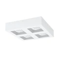 Biała lampa sufitowa LED FERREROS z kwadratową obudową i czterema prostokątnymi modułami świetlnymi rozmieszczonymi symetrycznie.