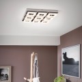 Lampa sufitowa LED FRADELO 9x3,8W zamontowana w nowoczesnym wnętrzu, z dziewięcioma punktami świetlnymi emitującymi ciepłe białe światło 3000K.
