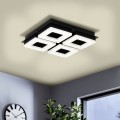 Lampa sufitowa LED FRADELO 1 4x3,5W z czarną kwadratową oprawą i czterema jasnymi modułami, zamontowana na suficie w nowoczesnym wnętrzu.