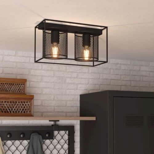 Czarna lampa sufitowa CATTERICK z trzema cylindrycznymi kloszami w metalowej ramie, zamontowana w nowoczesnym wnętrzu.