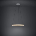 Na ciemnym tle lampa wisząca LED CADINARO tworzy delikatny świetlny okrąg i ciepłą poświatę wokół oprawy.