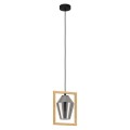 Lampa wisząca VIGLIONI z jednym przezroczystym szklanym kloszem otoczonym drewnianą ramą, zawieszona na czarnym przewodzie pod okrągłą podsufitką.