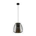 Lampa wisząca CURASAO z pojedynczym kloszem z czarnych tekstylnych pasów i złotym wnętrzem, zawieszona na przewodzie pod okrągłą podsufitką.