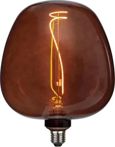 Dekoracyjna żarówka LED filament E27 z bursztynową szklaną bańką w kształcie kopuły. Spiralny filament LED emituje ciepłe światło dekoracyjne. Designerska żarówka do lamp stołowych i wiszących.