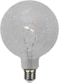 Żarówka LED E27 z przezroczystym kloszem o fakturze kryształków, widoczny filament wewnątrz, dekoracyjne źródło światła do nowoczesnych lamp i opraw.