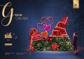 Dekoracja świetlna Gnom Całuski w przestrzeni miejskiej, dwie postacie gnomów z czerwonymi czapkami i motywem serc, wykonane z igliwia i dwustronnego LED neon, przeznaczone do iluminacji walentynkowej.