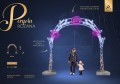 Pergola różana LED dekoracyjny fotopunkt w formie świetlnego łuku z motywem róż, instalacja parkowa do zdjęć ustawiona w przestrzeni miejskiej, przyciągająca uwagę eleganckim światłem i romantyczną formą kompozycji. ID 125061.
