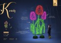 Kwiaty LED dekoracyjny fotopunkt z wysokimi podświetlanymi tulipanami i zielonymi liśćmi, instalacja parkowa do zdjęć ustawiona w przestrzeni miejskiej, przyciągająca uwagę intensywnymi kolorami i świetlną formą kompozycji. ID 127120.