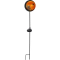 Solarny lampion ogrodowy z motywem wróżki i gwiazdy w okrągłej oprawie, emitujący ciepłe światło LED, na stojaku do wbicia w ziemię, jako dekoracyjne oświetlenie ogrodu lub tarasu.