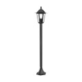 Lampa stojąca LATERNA 4 z czarną metalową konstrukcją, przeszklonym kloszem i dekoracyjnym daszkiem.
