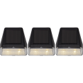 Lampy solarne LED z panelem na górze – prosty design i czytelna forma, przeznaczone do montażu na ścianie zewnętrznej.