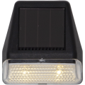 Lampa solarna LED z widocznym panelem i dolnym źródłem światła, do montażu na ścianie lub ogrodzeniu.