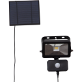 Reflektor LED solarny z czujnikiem ruchu kompaktowe rozwiązanie do oświetlenia przestrzeni wokół domu.