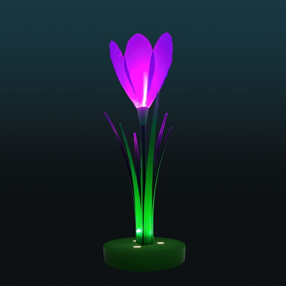 Dekoracja świetlna LED w kształcie krokusa na ciemnym tle, nowoczesny fotopunkt z podświetlanymi płatkami i zielonymi liśćmi, przeznaczony do przestrzeni miejskich, eventów i instalacji plenerowych.