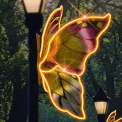 Motyl LED 3D na latarni – dekoracja świetlna z liniowym oświetleniem LED tworzącym efekt neonowej poświaty, kolorowy nadruk skrzydeł na tworzywie, iluminacja do parków, ulic i przestrzeni miejskich.