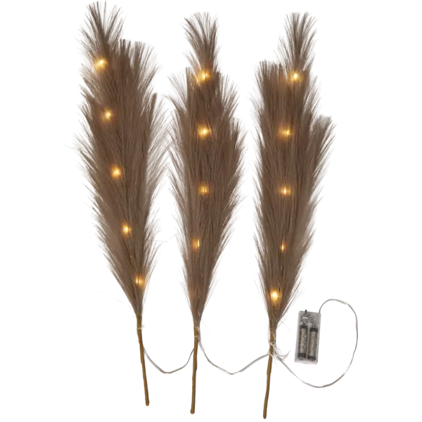 Zestaw trzech dekoracyjnych piór LED w kolorze brązowym na przewodzie z zasilaniem bateryjnym emitujących ciepłe światło jako ozdoba do wnętrz.