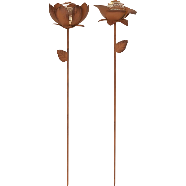 Solarne lampki ogrodowe w formie kwiatów, ustawione na rabacie i emitujące ciepłe światło, które podkreśla rośliny i tworzy przytulny klimat po zmroku.